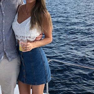 Forever 21 mini denim skirt with button front. Size small.